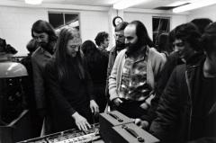Tom Zahuranec talks with a participant, at a KPFA Radio Event, Mills College, Oakland CA, 1971