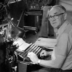 Walter Ellis, seated at keyboard, looking at the camera, 1973 (2nd)