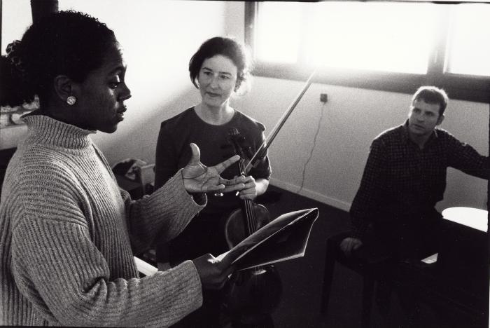 Errollyn Wallen talks with violist Ellen Ruth Rose and pianist Michael Seth Orland during a rehearsal in Woodside (cropped image)