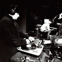 DJ Eddie Def, Chris Brown, & William Winant, during a rehearsal for OM 7, (2001)