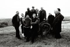 Featured composers and organizers of OM 7, full length portrait, facing forward, Woodside, 2001 (cropped image)