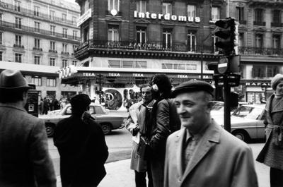 Bernard Heidsieck being interviewed by Charles Amirkhanian on a busy street in Paris, 1973