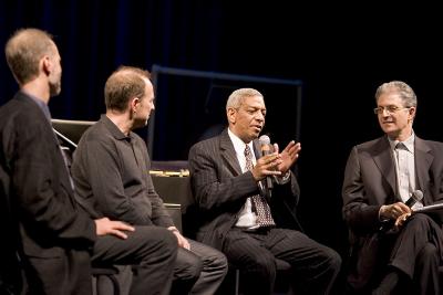 John Luther Adams, Evan Ziporyn, Billy Bang, and Charles Amirkhanian, seated, during panel discussion, ver. 10, San Francisco CA (2005)