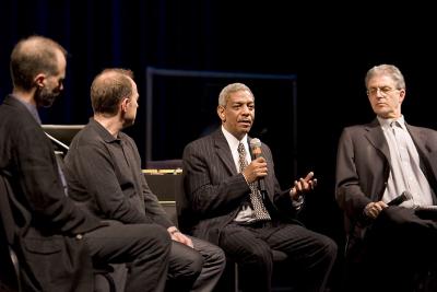 John Luther Adams, Evan Ziporyn, Billy Bang, and Charles Amirkhanian, seated, during panel discussion, ver. 13, San Francisco CA (2005)