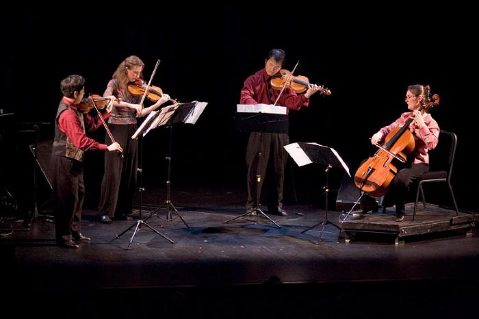 Del Sol Quartet performing on stage during OM 11, ver. 10