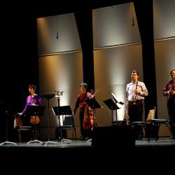 The Left Coast Chamber Ensemble, full length portrait, standing on stage, facing forward, San Francisco CA., (2010)