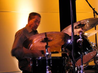 Warren Smith, half length portrait, playing the drums during a rehearsal for OM 15