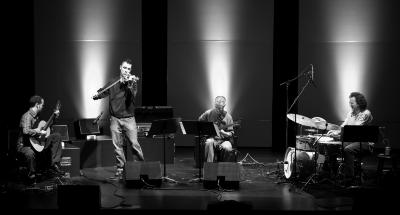 Gyan Riley, Timb Harris, Michael Manring, & Scott Amendola (l to r), full length portrait, performing on stage, San Francisco CA., (2010)