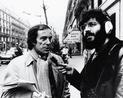 Bernard Heidsieck, being interviewed by Charles Amirkhanian in Paris, heads and shoulders portrait, 1973