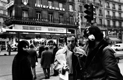 Bernard Heidsieck being interviewed by Charles Amirkhanian on a busy street corner in Paris, 1973