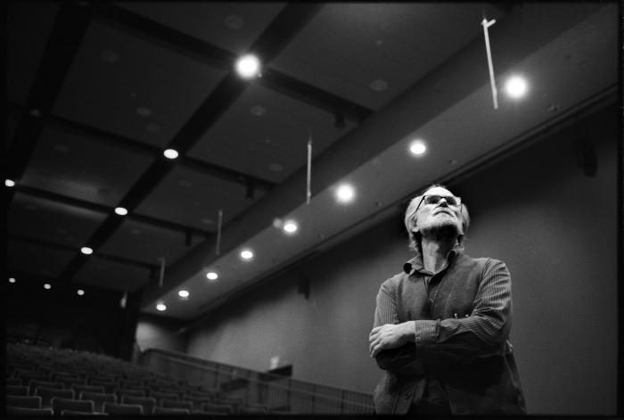 Half length portrait of Trimpin observing his installation for David Jaffe's piece The Space Between Us, San Francisco CA (2011)