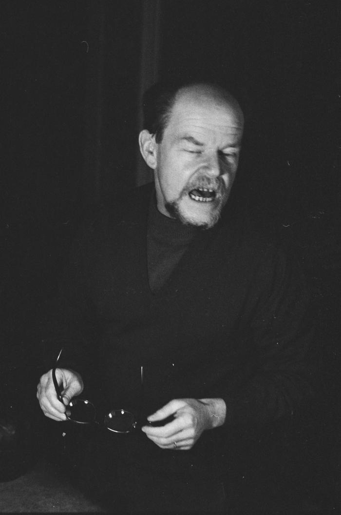 Claude Ballif, half length portrait, sitting, holding eye glasses, Paris France, 1973