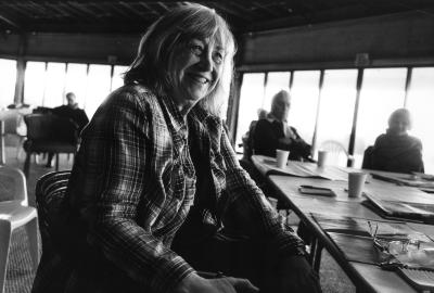 Gloria Coates, seated and smiling during composer discussions at the Djerassi Resident Artists Program, Woodside CA (2012)