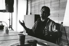 John Kennedy, seated and talking during his presentation at the Djerassi Resident Artists Program, Woodside CA (2012)