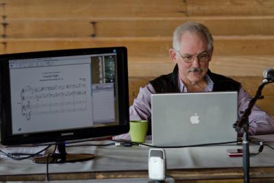 Kyle Gann, seated during his presentation at the Djerassi Resident Artists Program, Woodside CA (2011)