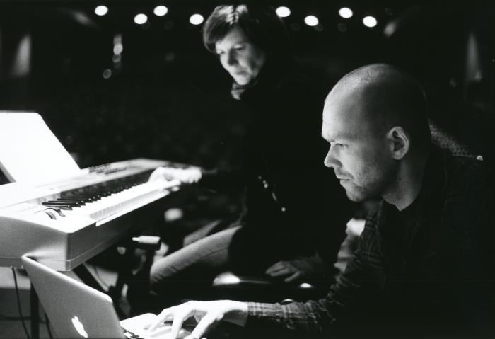 Ellen Ugelvik of asamisimasa and Øyvind Torvund, seated in the performance hall during a rehearsal prior to OM 17, vs. 2 