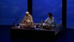 G.S. Sachdev and Swapan Chaudhuri in performance during the first concert of OM 18