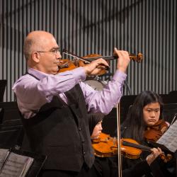 Violinist Movses Pogossian performing during the third concert of OM 20, San Francisco CA (2015)