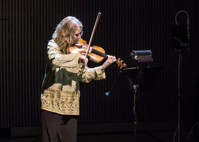Violinist Kate Stenberg performing during OM 20, San Francisco CA (2015)