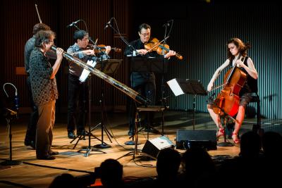 Stephen Kent  and the Del Sol String Quartet performing at OM 20, San Francisco CA (2015)