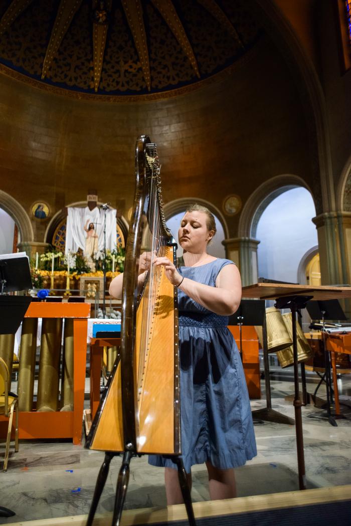 Harpist Meredith Clark rehearsing prior to the second concert of OM 22, San Francisco CA (May 20, 2017)