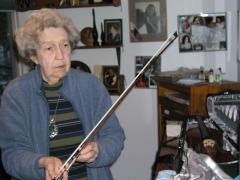 Anahid Ajemian, displaying one of her violin bows, Riverdale, New York (2009) 