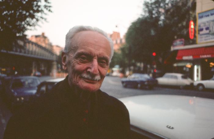 Ivan Wyschnegradsky, looking at camera while on a street in Paris (1976)