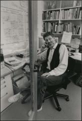 Charles Amirkhanian on the phone in his office at KPFA-FM, Berkeley CA (1992)
