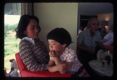 Yoko, Mako, and Conlon Nancarrow, seated in a small bar in Mexico City, 1977