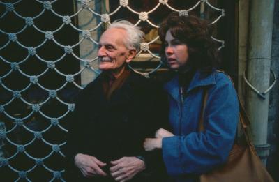Ivan Wyschnegradsky and Carol Law arm in arm in front of a Parisian storefront, vs. 3 (1976)