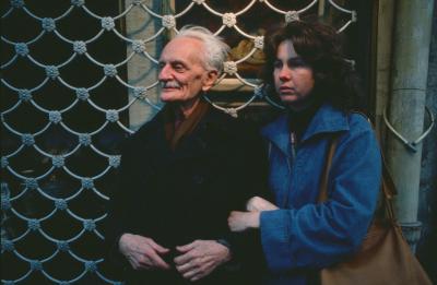 Ivan Wyschnegradsky and Carol Law arm in arm in front of a Parisian storefront (1976)