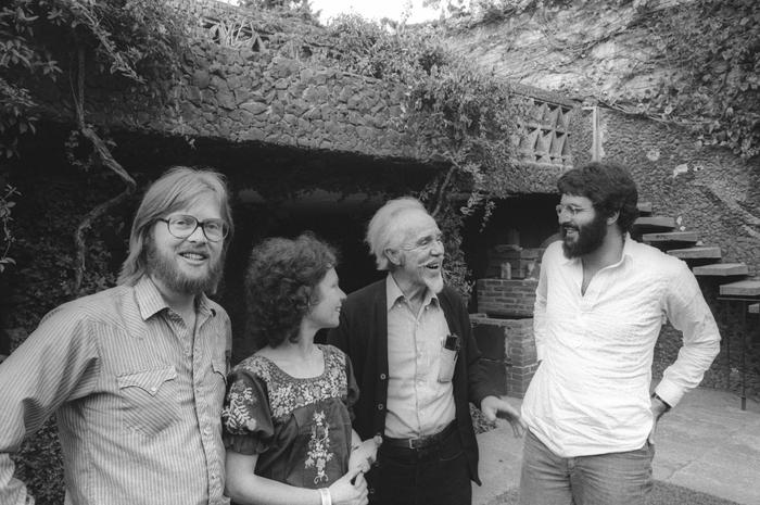 Robert Shumaker, facing forward, with Eva Soltes, Charles Amirkhanian, and Conlon Nancarrow, facing each other, half length portrait, Mexico Cioty, (1977)