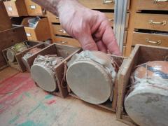 A set of small ceramic drums originally framed by Conlon Nancarrow, 2012