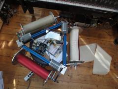 Piano roll feeding mechanism for Trimpin's installation Volatile Memory, 2012