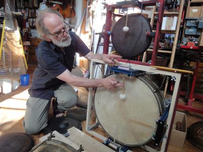 Trimpin testing mallets on part of the Nancarrow Percussion Orchestra, Seattle (2012)