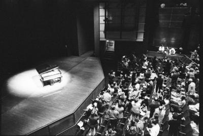 Modified piano and Conlon Nancarrow, in spotlights, in front of audience, ver. 2, San Francisco CA, (1993)