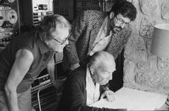 Gladys Nordenstrom, and Charles Amirkhanian, both standing, with Ernst Krenek, seated in Krenek's home studio (1985)