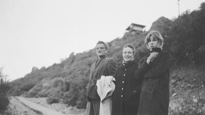 Portrait of George Oppen, Mary Oppen, and Carol Law on Mt. Tamalpais, Mill Valley, CA (1969)