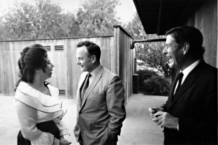 Pat Woodbury, John Cage, and unidentified man, half-length portrait, Putah Creek Lodge, Davis California, 1969