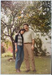 John and Sylvia White standing in their backyard in Los Angeles, 1983