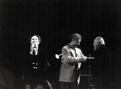 Luc Ferrari (center), shaking hands with Conlon Nancarrow, Boulogne France, 1991