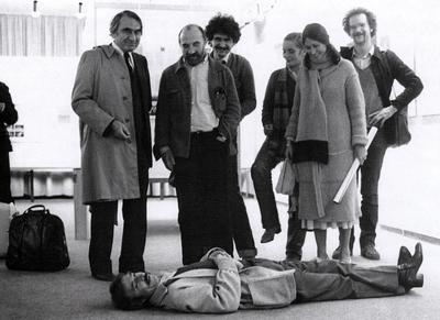 Luc Ferrari, lying on the floor, with group of composers and friends, Bonn Germany, 1982