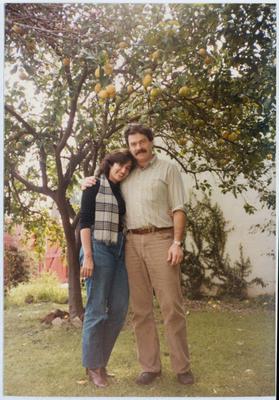 John and Sylvia White standing in their backyard in Los Angeles, 1983