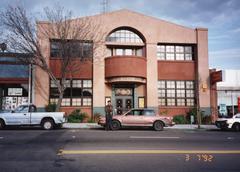 The new KPFA building, with Charles Amirkhanian standing in front, Berkeley CA, 1992