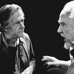 John Cage listening to Conlon Nancarrow, head and shoulders portrait facing each other, Telluride, CO. (1989)