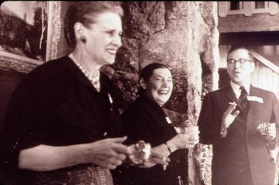 Elsa Knight Thompson, an unidentified woman, & Alan Rich (l to r), half length portrait, during a reception or meeting