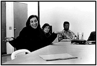 Calliope Tsoupaki, Frances White, & Alvin Singleton, seated around conference table, facing forward, (1995)