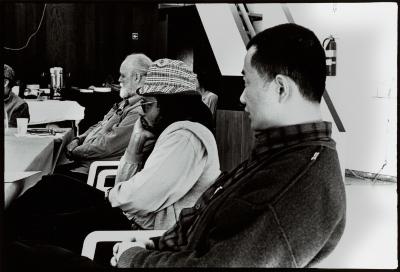Lou Harrison, Don Byron, and Tan Dun, half length portrait, seated at table, facing left, Woodside CA, (1995)