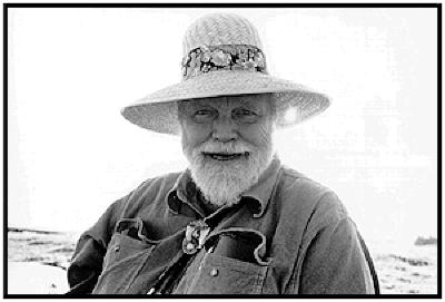 Lou Harrison, head and shoulders portrait, facing forward, wearing hat, Woodside CA, (1995)