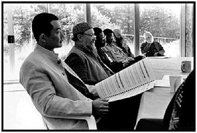 Tan Dun, Terry Riley, Don Byron, Alvin Singleton, Rex Lawson, & William Colvig, seated, facing right, Woodside CA, (1995)